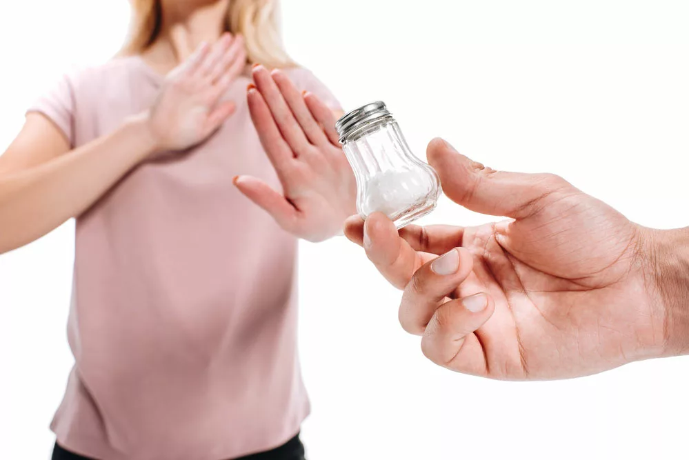 woman rejecting salt